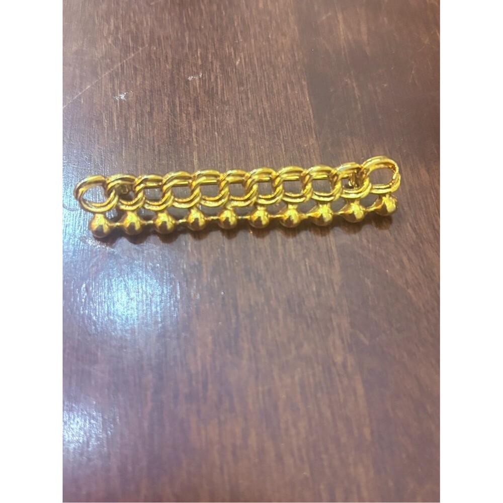 Vintage gold tone chain brooch